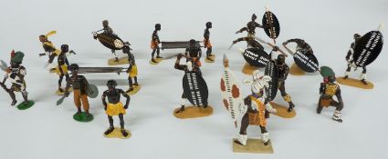 Eighteen Britains and similar lead and diecast model tribal figures including Zulu Warriors,