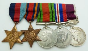 British Army WWII medals comprising 1939/1945 Star, Burma Star, Defence Medal, War Medal and Long