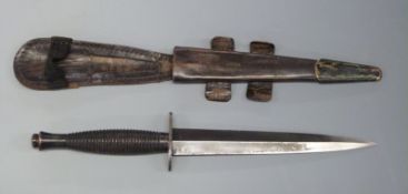 Fairbairn Sykes 3rd pattern fighting knife with 18cm blade stamped 'H Cooper Sheffield England',