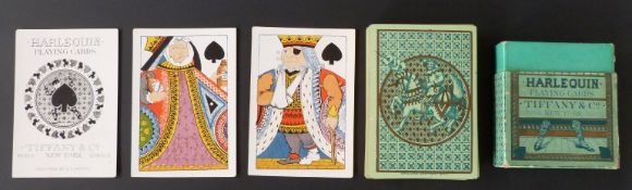 Tiffany & Co, New York, USA Harlequin transformation playing cards.  Designed by C.E. Carryl. Gilt