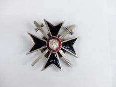 WWII German Nazi Third Reich black enamelled War Merit Cross of the Knights Cross style, with