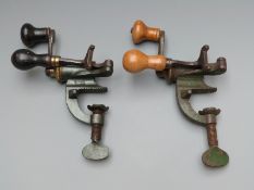 Two 12 bore steel and brass shotgun cartridge reloading tools.