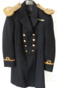 Royal Naval coat with sub-lieutenant rank insignia to sleeve, buttons, medal ribbon and