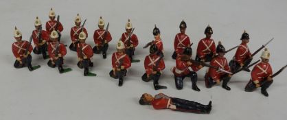 Nineteen Britains lead model infantry soldiers all but one, kneeling and 4cm tall