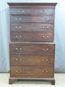 Georgian mahogany chest on chest with two over six graduated drawers and dentil cornice raised on
