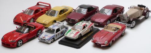 Nine Burago and Maisto mainly 1:18 scale diecast model vehicles including Ferrari, Dodge Viper,