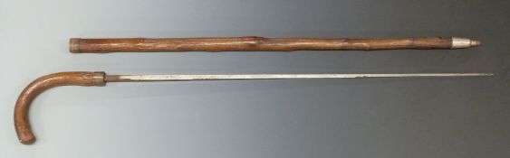 Wooden cased swordstick with Mole stamped to the 75cm square steel blade.