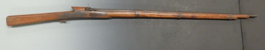 Middle Eastern matchlock gun with steel lock plates and 40 inch barrel, overall length 152cm.