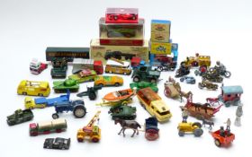 Forty-seven Corgi, Matchbox, Britains and similar diecast model vehicles, figures and accessories,