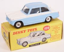 Dinky Toys diecast model Triumph Herald with pale blue and white body 189, in original box.