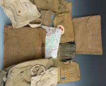 A collection of mainly WWII canvas bags, pouches, first aid bags and map cases