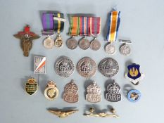 Three silver war wound badges, three silver ARP badges, miniature medals etc