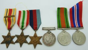 WWII British medals comprising 1939/45 Star, Italy Star, Africa Star with clasp for 1st Army,