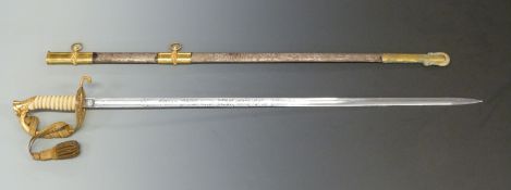 American naval officer's sword with brass hilt, shagreen grip and etched 76cm blade marked USN,