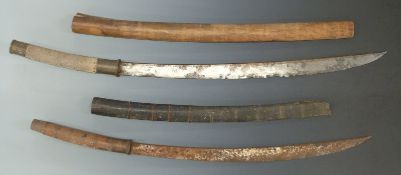 Two East Asian Dha swords both with curved blades and wooden scabbards, one with shagreen handle,