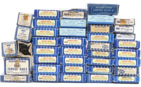 Forty Hornby Dublo 00 gauge model railway points, rail sets etc., all in original boxes