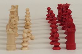 Calvert ivory antique chess set in red and natural with finely carved knights and kings wearing