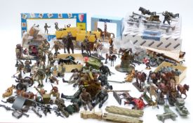 A large collection of model solders, vehicles, cannon and accessories, some in original boxes.