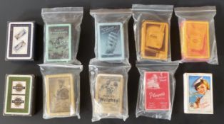 Ten packs of smoking and related advertising playing cards