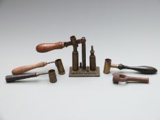 Shotgun cartridge reloading capper/decapper together with three shot/powder measures one by Ward &