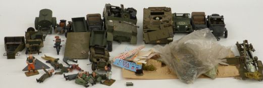 A collection of King & Country and similar model military vehicles and figures.