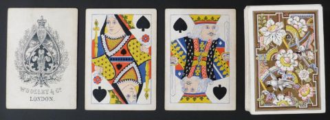 Woolley & Co, London playing cards. Standard double ended courts, square corners, no indices, one