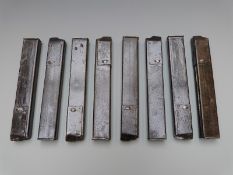 Eight Sten machine gun magazines