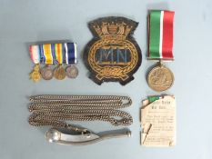 WWI Mercantile Marine Medal named to George Bond together with a set of miniatures, cloth badge