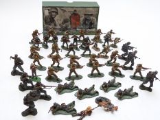 Forty-four Britains World War II model soldiers, some in original box.