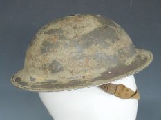 British Army WWII 'Brodie' steel helmet stamped JSS 1940 with liner and chinstrap