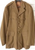 British Army number 2 dress jacket with REME buttons and rank insignia for Captain