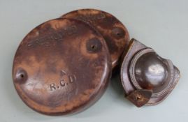 British Army WWI two leather cordite carrier tops stamped No50 fireproofed 1916, together with a