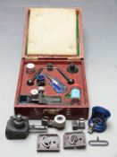 Anschutz target rifle sight set in fitted wooden box together with various rifle spares, mounts