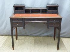19th or early 20th century carved mahogany leather inset desk with an arrangement of drawers and
