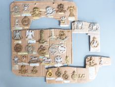British Army collection of cavalry regimental badges including 7th Dragoon Guards, 19th Hussars,