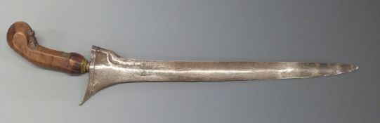 Sumatran Kris dagger with 35cm Damascus blade, carved handle and gilt mendak, overall length 46cm.