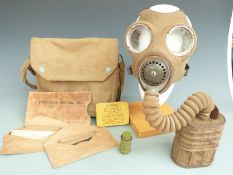 British Army WWII gas mask with canister, eye shields and full ointment tin