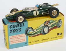Corgi Toys diecast model Lotus-Climax Formula 1 Racing Car with green body, yellow stripe, white and