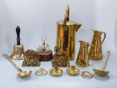 Brass hand bell, kettle, graduated jugs and elephant bookends, oak cruet etc