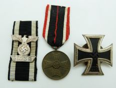 WWII German Nazi Third Reich Iron Cross with bar emblem and War Merit medal