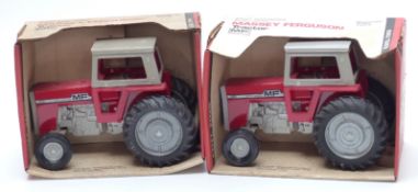 Two ERTL diecast model Massey-Ferguson Tractors 1106, both in original boxes.