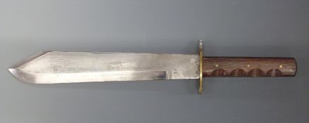 Wells Fargo Bowie knife with engraved 26.5cm blade, brass hilt and wooden handle.