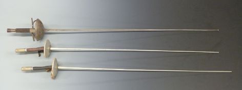 Three epi or fencing swords marked Leon Paul of Toledo