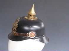 German / Bavarian Army 1897 model black metal pickelhaube complete with leather chin strap and