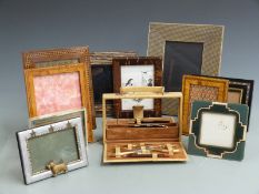 Ostrich skin cased manicure set and a quantity of inlaid and designer picture frames