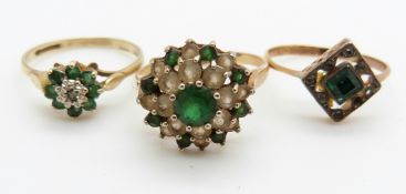 A 9ct gold ring set with a diamond and emerald and two 9ct gold rings with faux emeralds, 5.5g