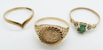 A 9ct gold ring set with a diamond, a 9ct gold ring set with an emerald and diamonds and another 9ct