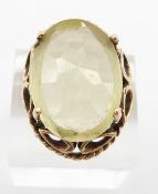 A 9ct gold ring set with a large citrine, 10.2g, size N