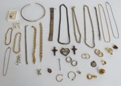 A collection of silver jewellery including three curb link necklaces, bracelets, various pendants