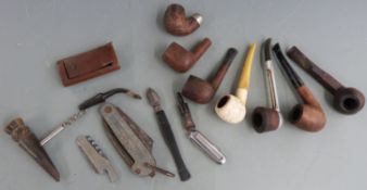 A collection of pipes etc including Falcon folding knife